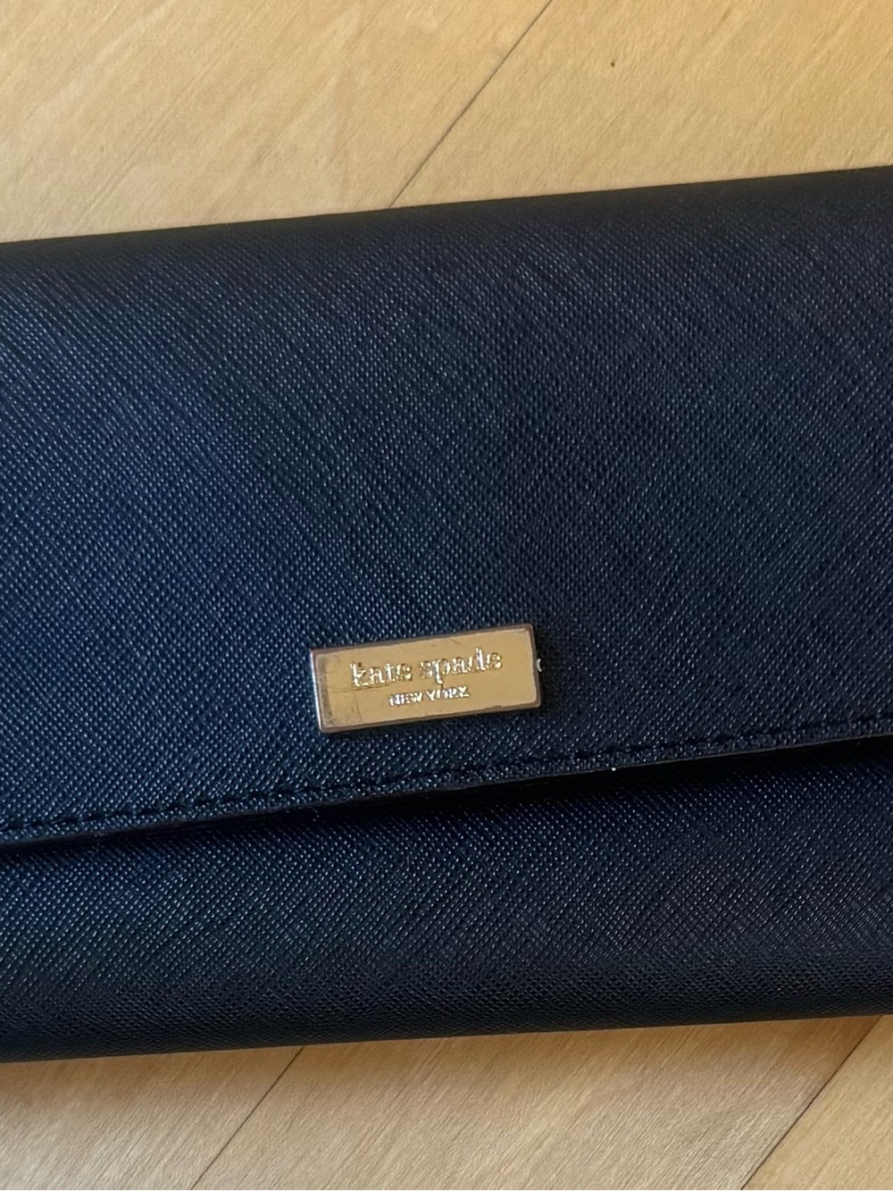 kate spade black faux leather continental wallet with gold plaque